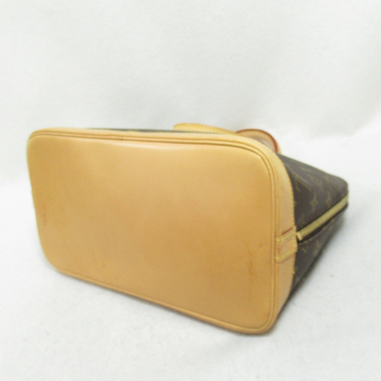 LOUIS VUITTON Alma Handbag