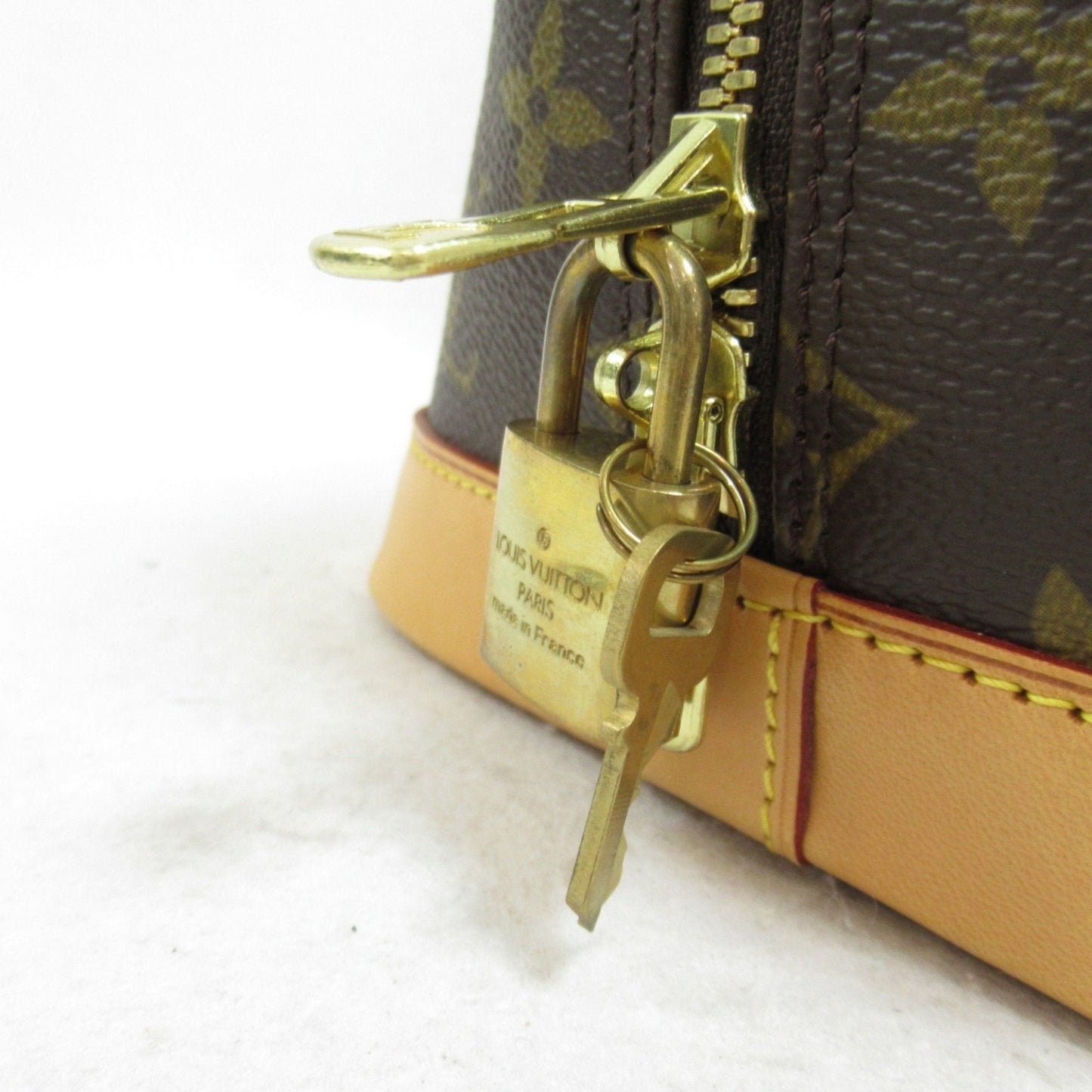 LOUIS VUITTON Alma Handbag