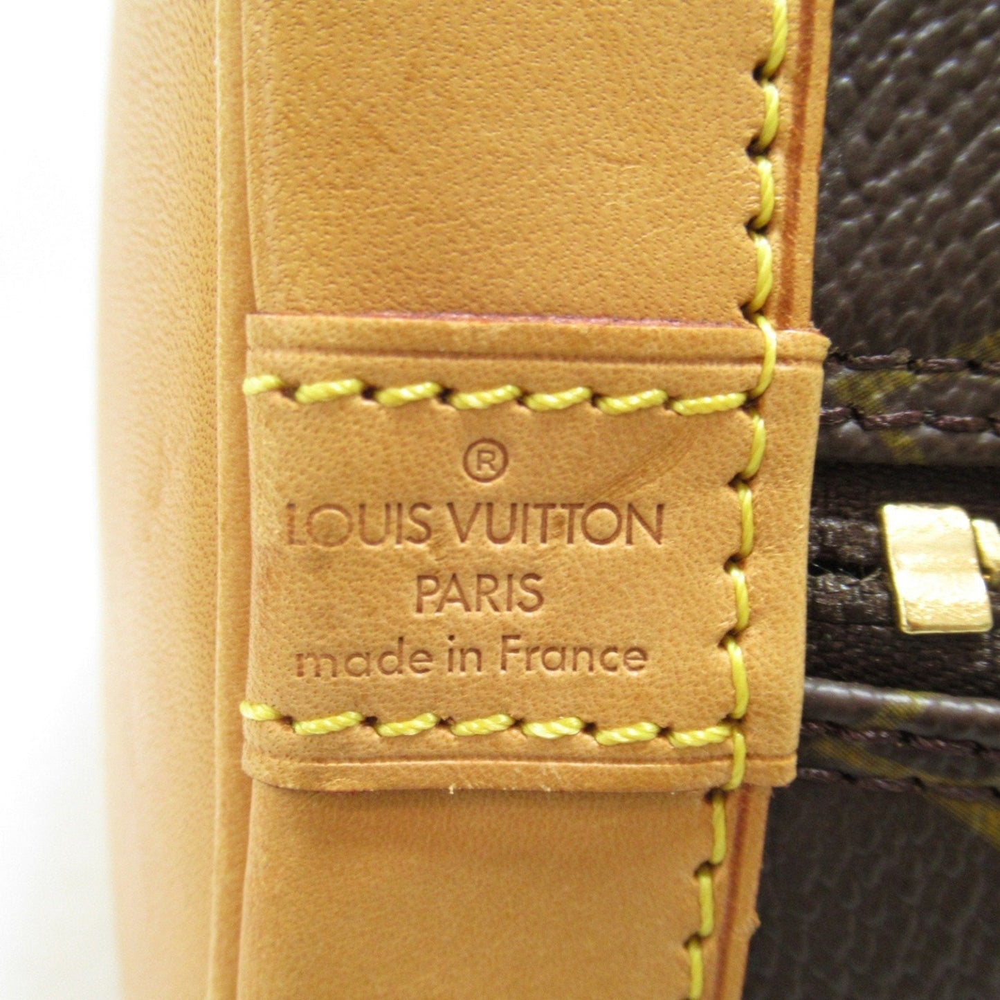 LOUIS VUITTON Alma Handbag