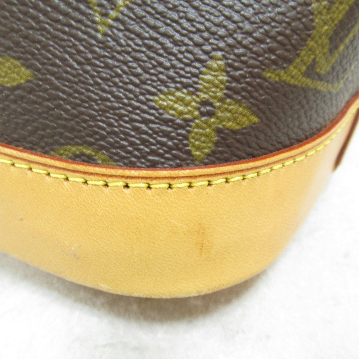 LOUIS VUITTON Alma Handbag