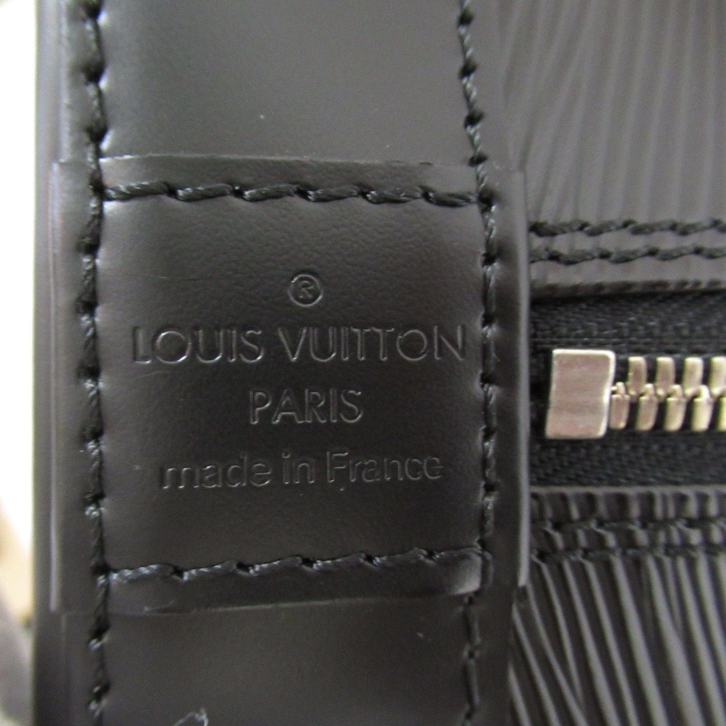 LOUIS VUITTON Alma Handbag