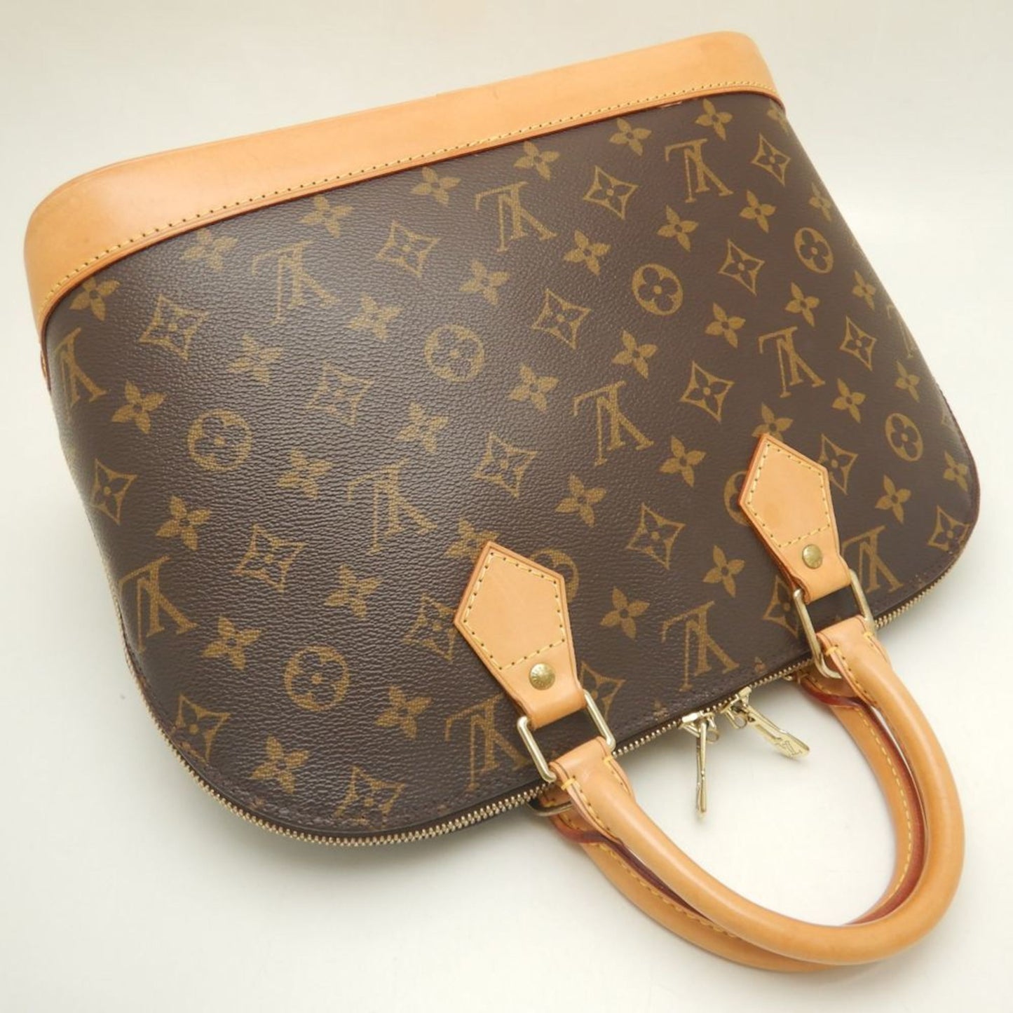LOUIS VUITTON Alma Handbag