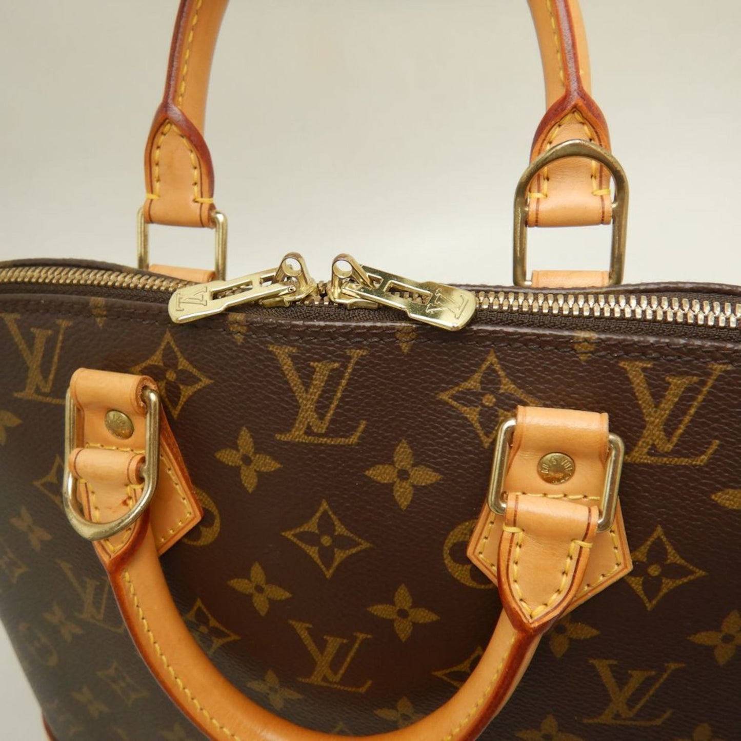LOUIS VUITTON Alma Handbag