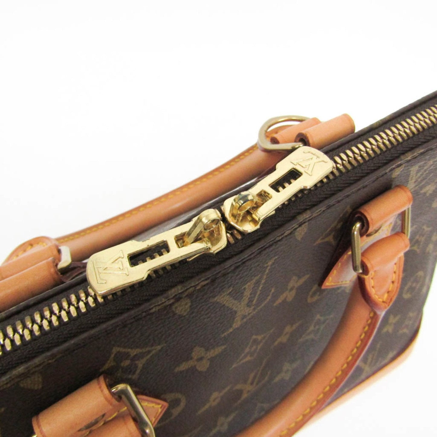 LOUIS VUITTON Alma Handbag