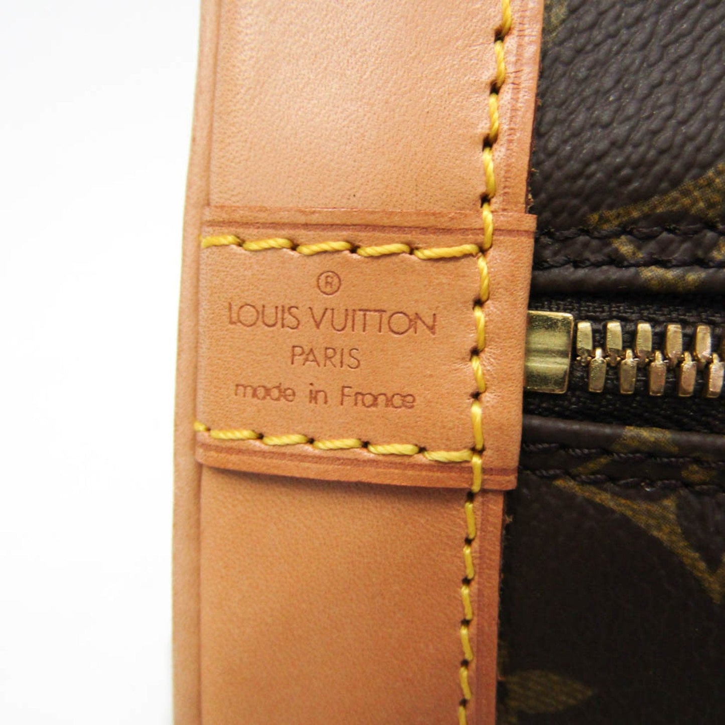 LOUIS VUITTON Alma Handbag