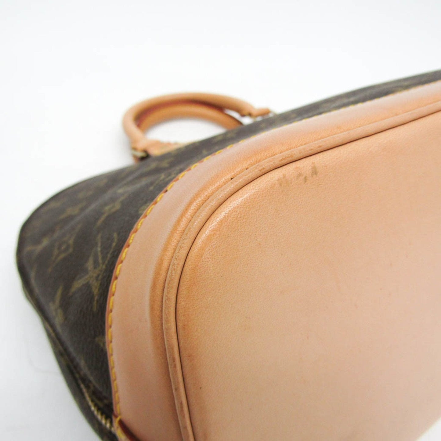 LOUIS VUITTON Alma Handbag