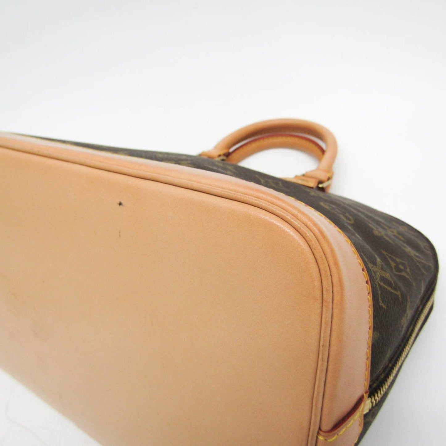 LOUIS VUITTON Alma Handbag