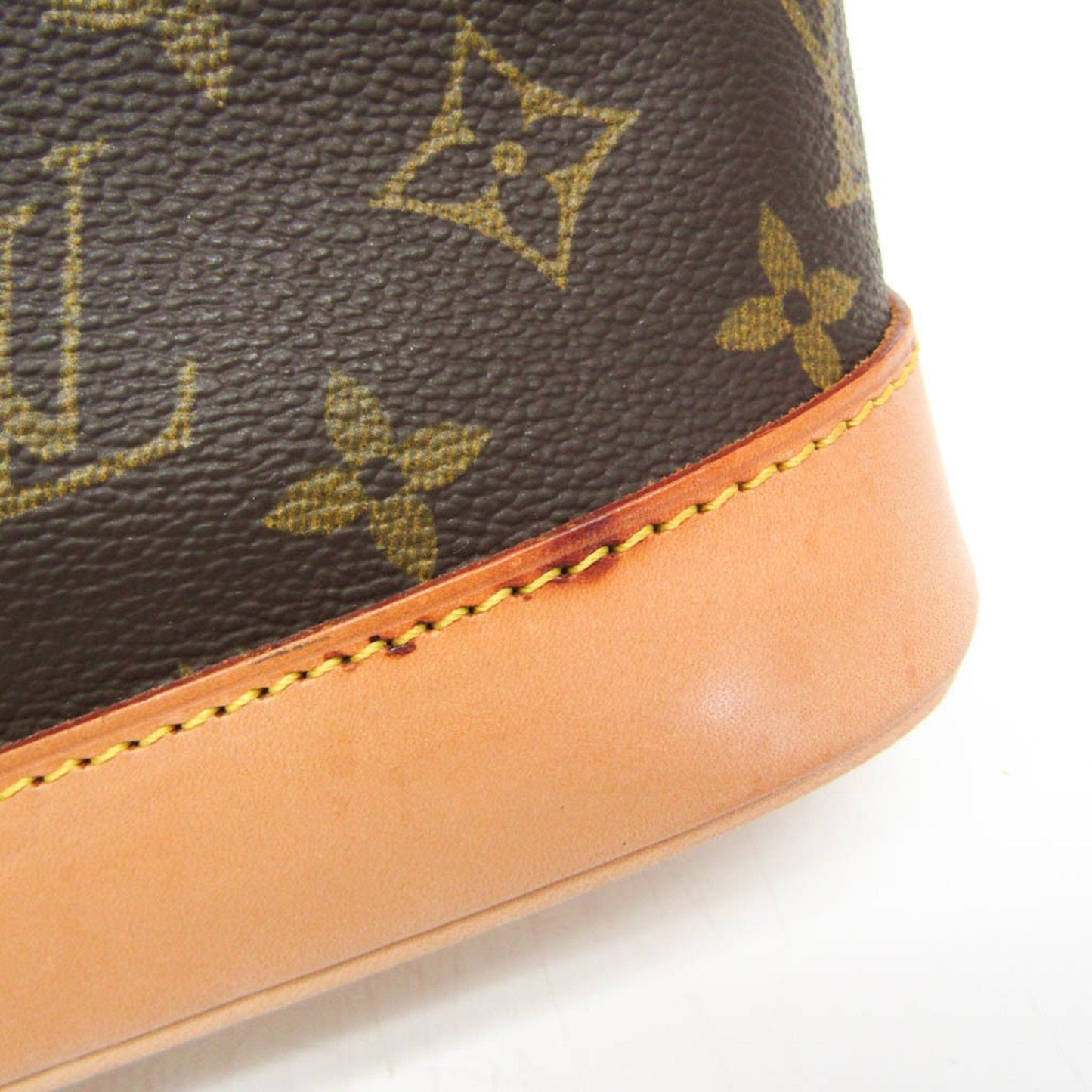 LOUIS VUITTON Alma Handbag