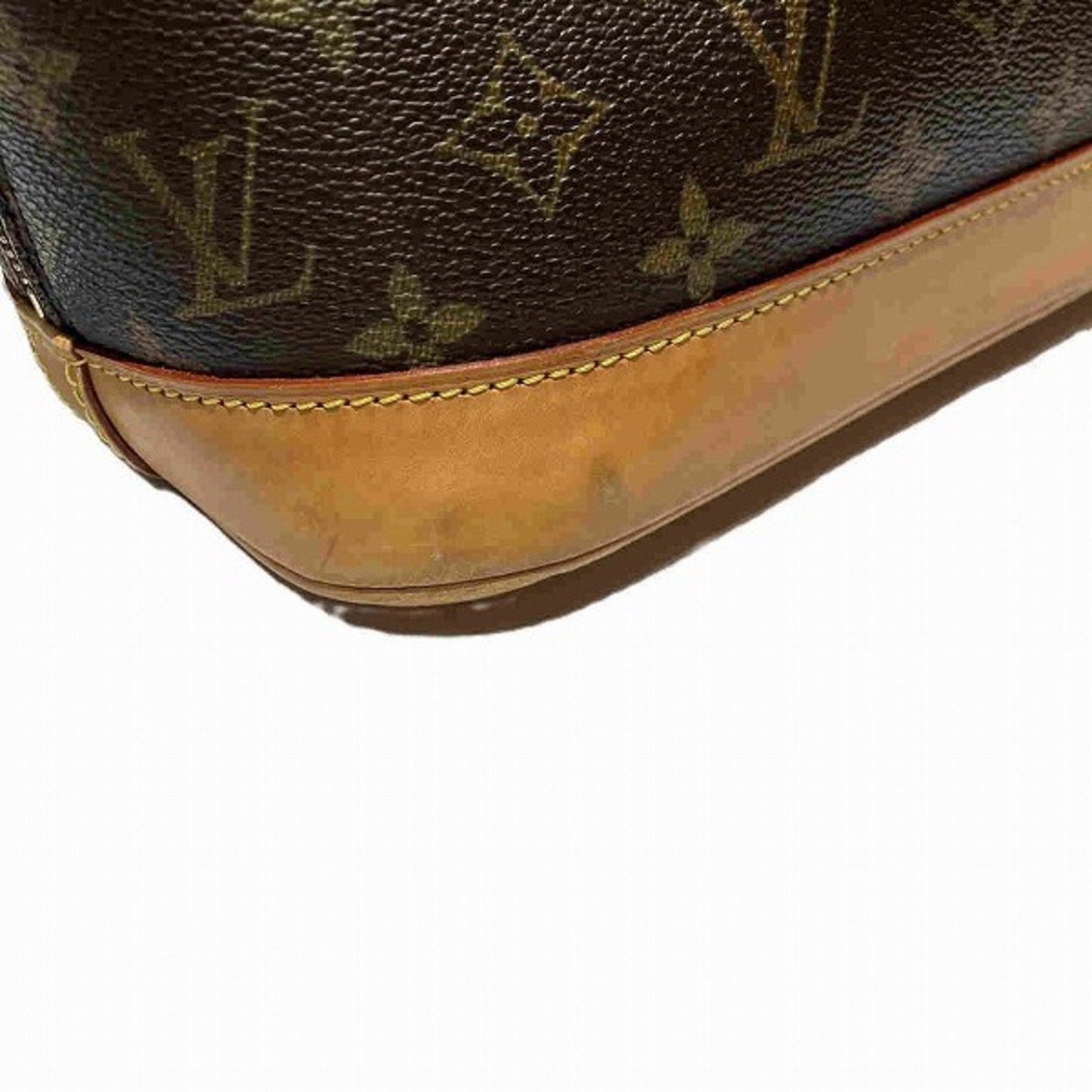 LOUIS VUITTON Alma Handbag
