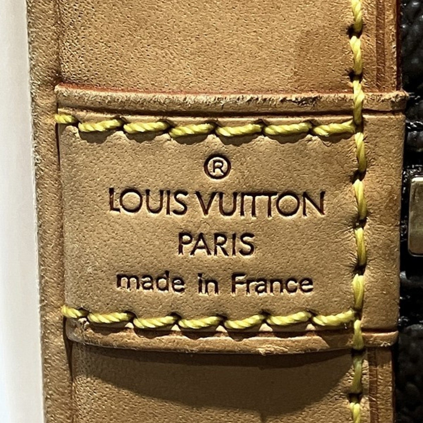LOUIS VUITTON Alma Handbag