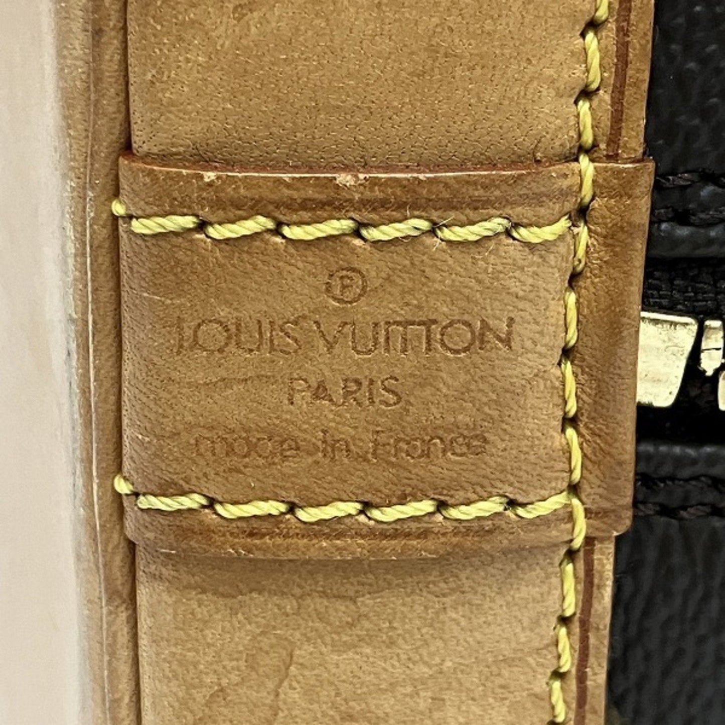 LOUIS VUITTON Alma Handbag