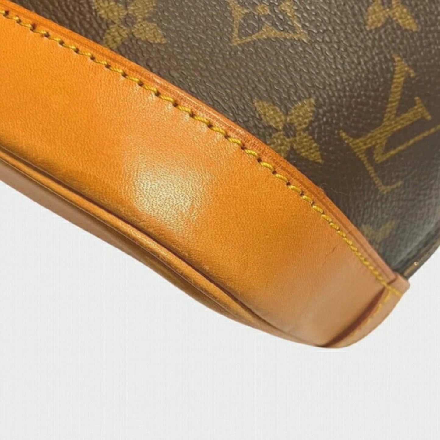 LOUIS VUITTON Alma Handbag