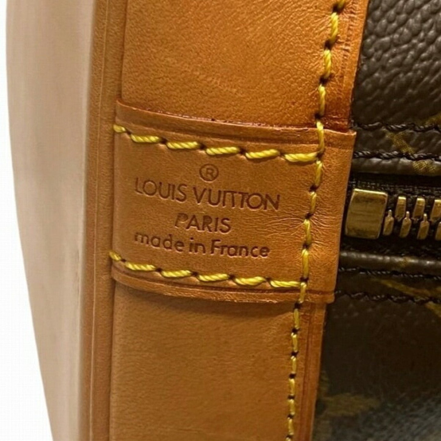 LOUIS VUITTON Alma Handbag