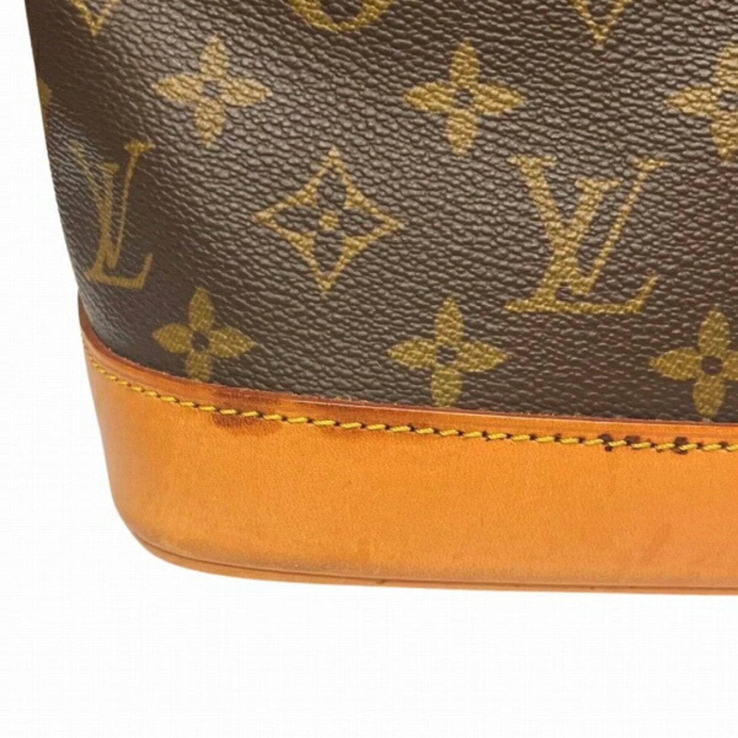 LOUIS VUITTON Alma Handbag