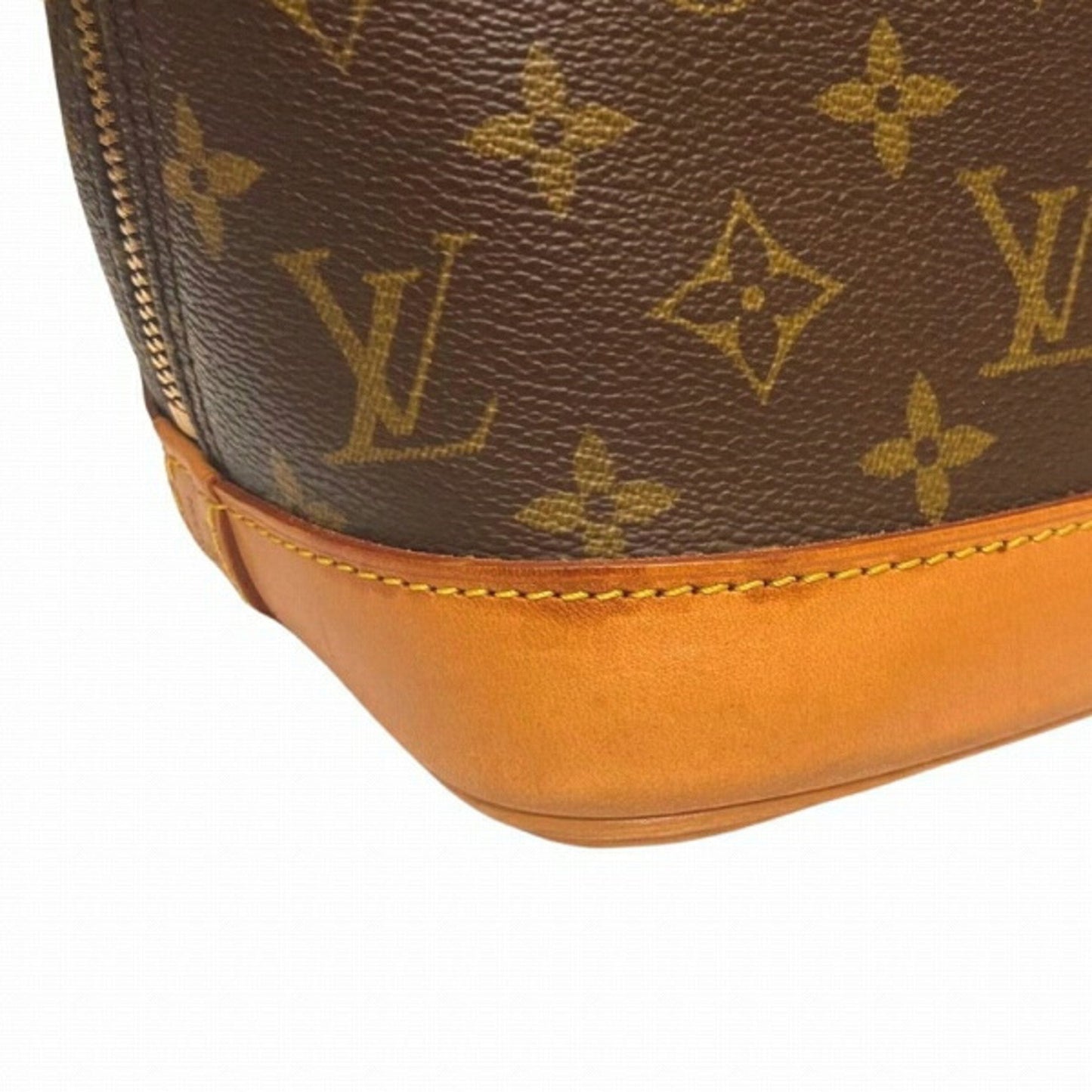 LOUIS VUITTON Alma Handbag