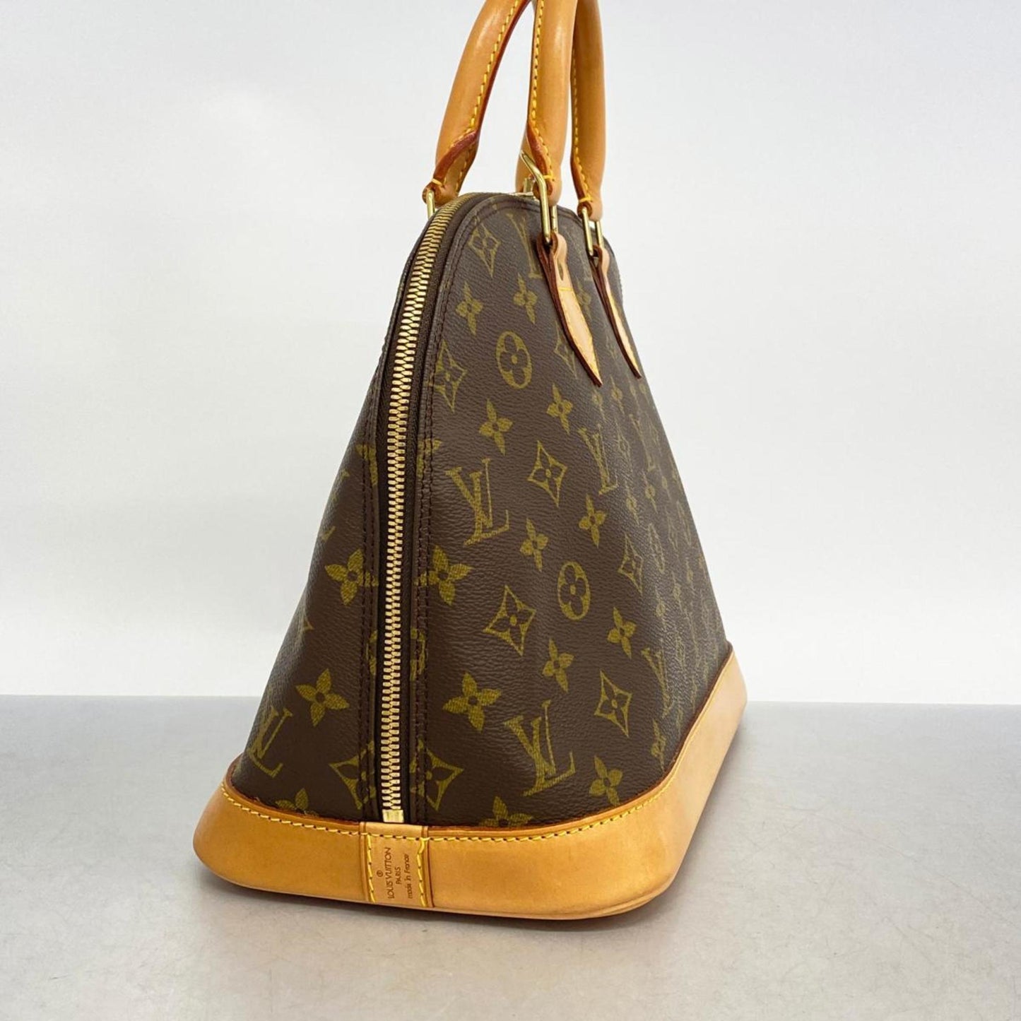 LOUIS VUITTON Alma Handbag