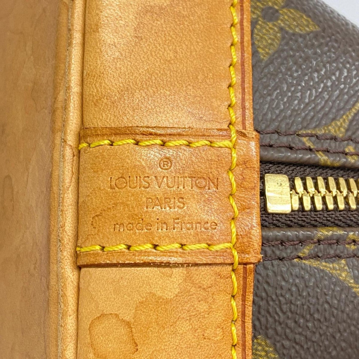 LOUIS VUITTON Alma Handbag