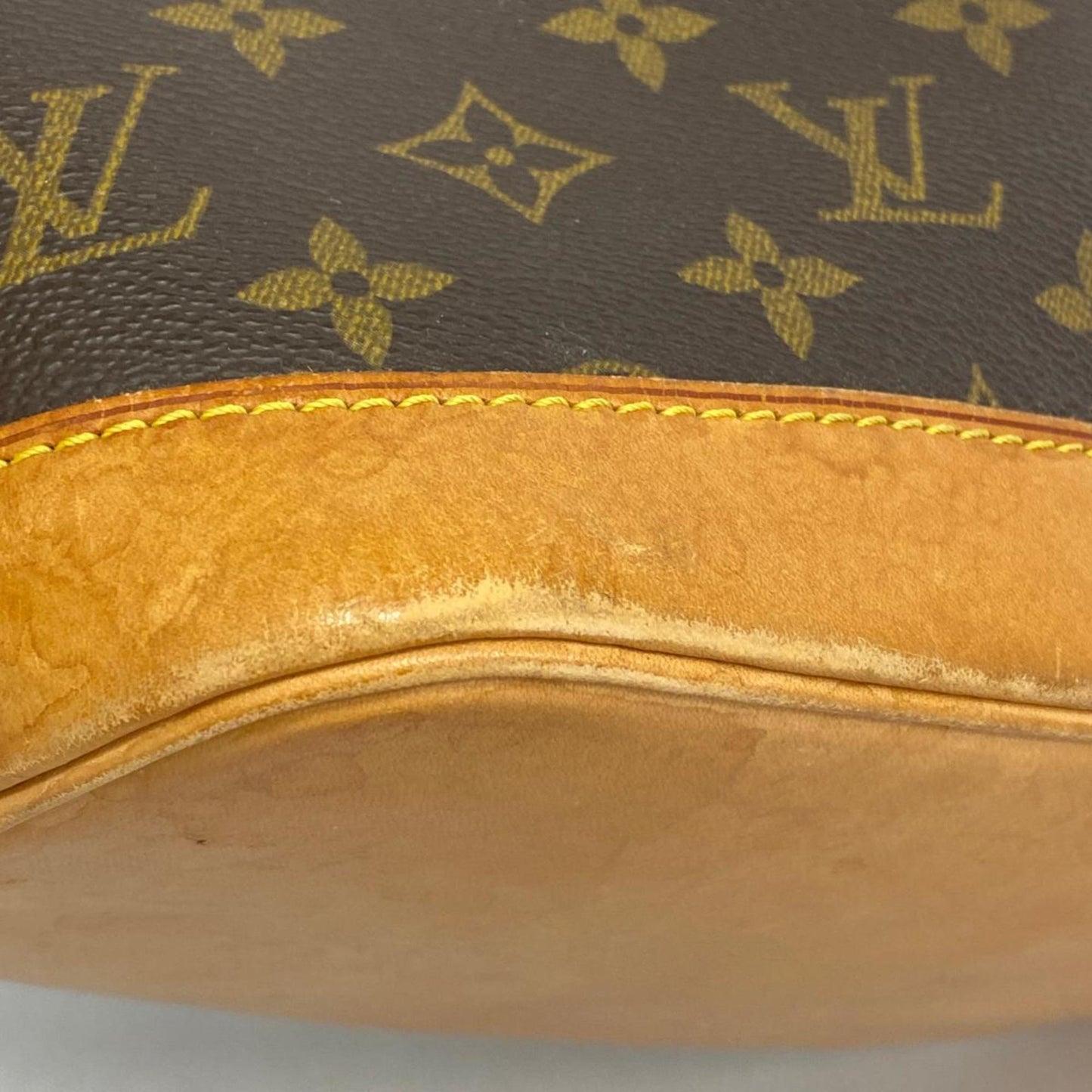 LOUIS VUITTON Alma Handbag
