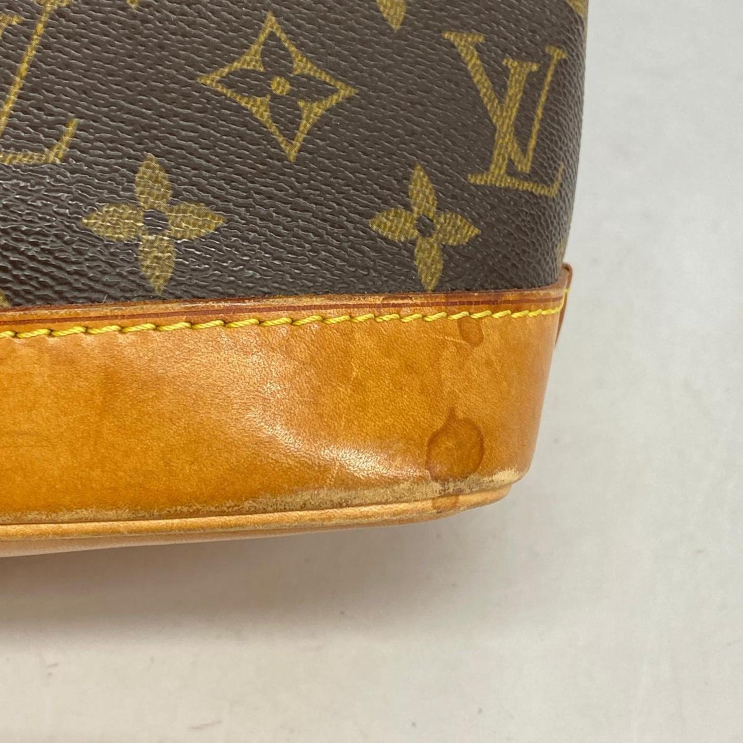 LOUIS VUITTON Alma Handbag