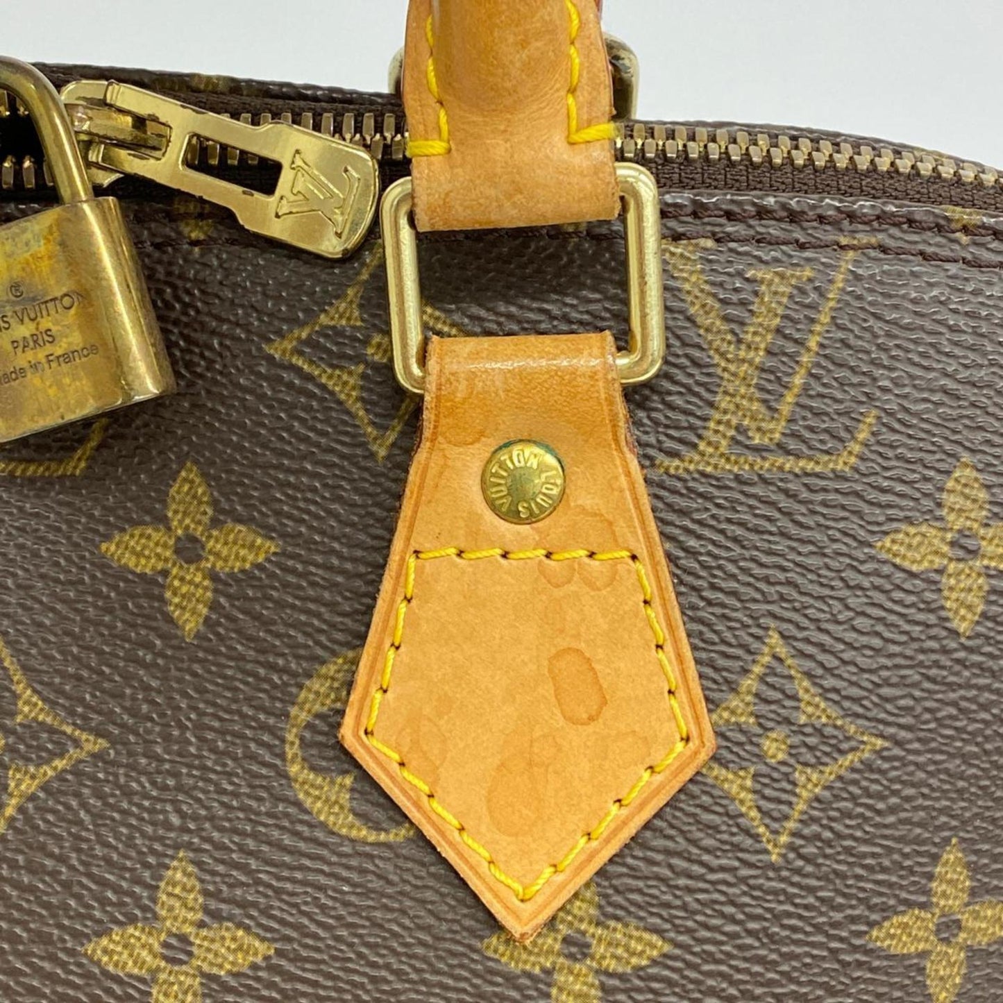 LOUIS VUITTON Alma Handbag