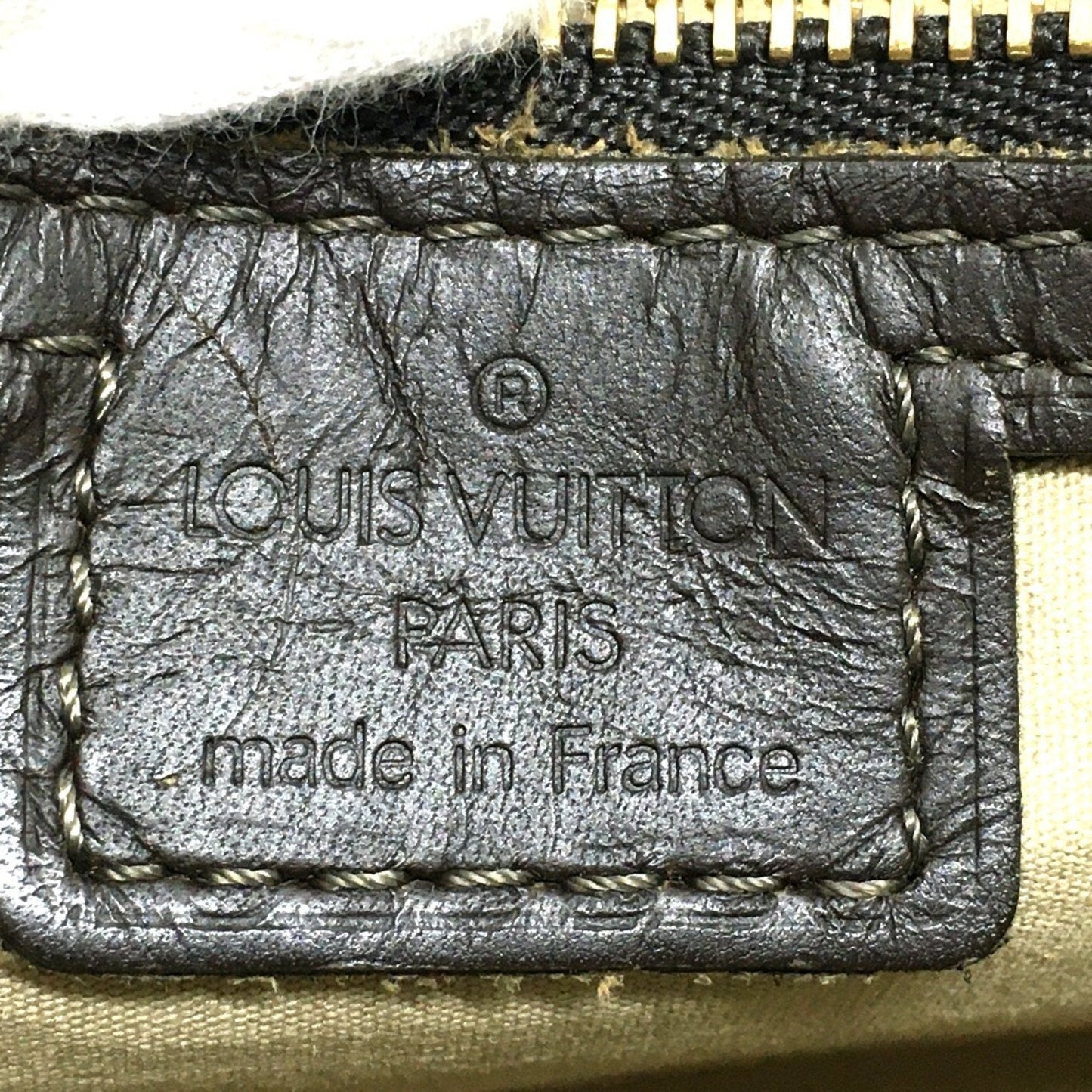 LOUIS VUITTON Alma Handbag