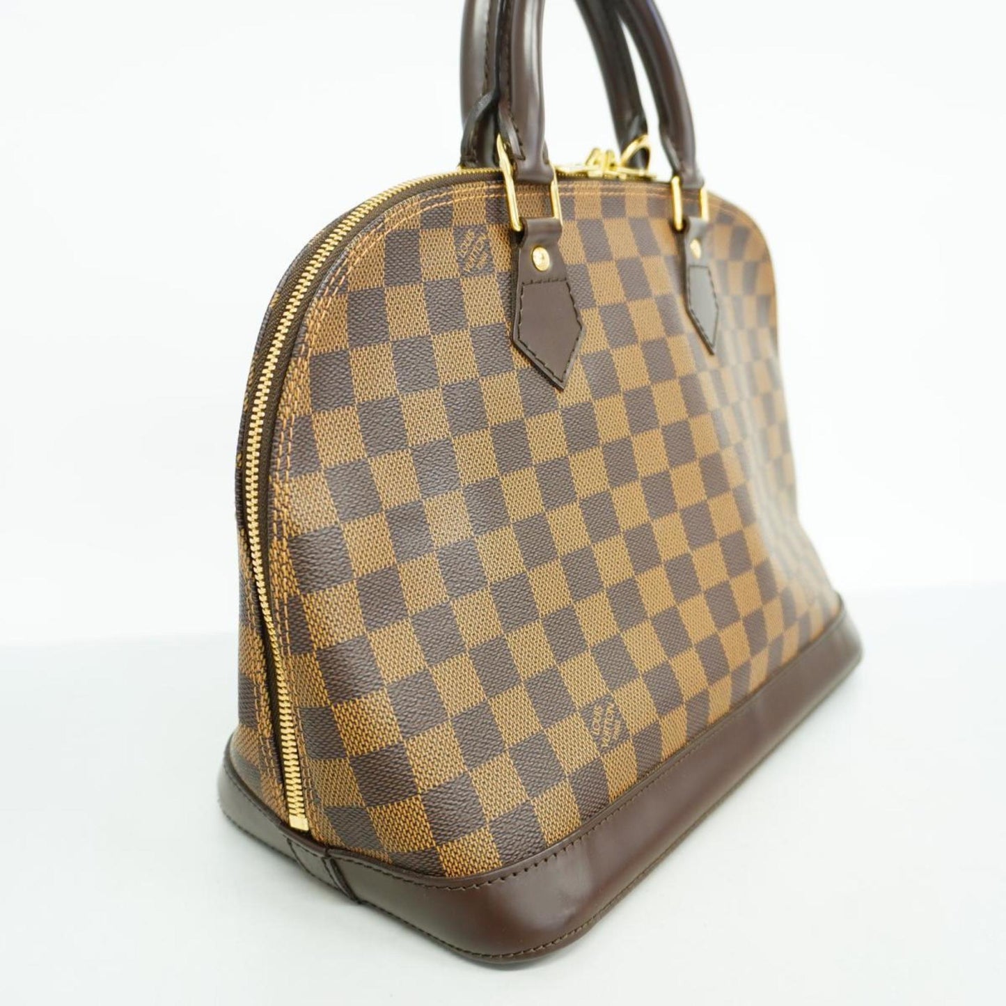 LOUIS VUITTON Alma Handbag