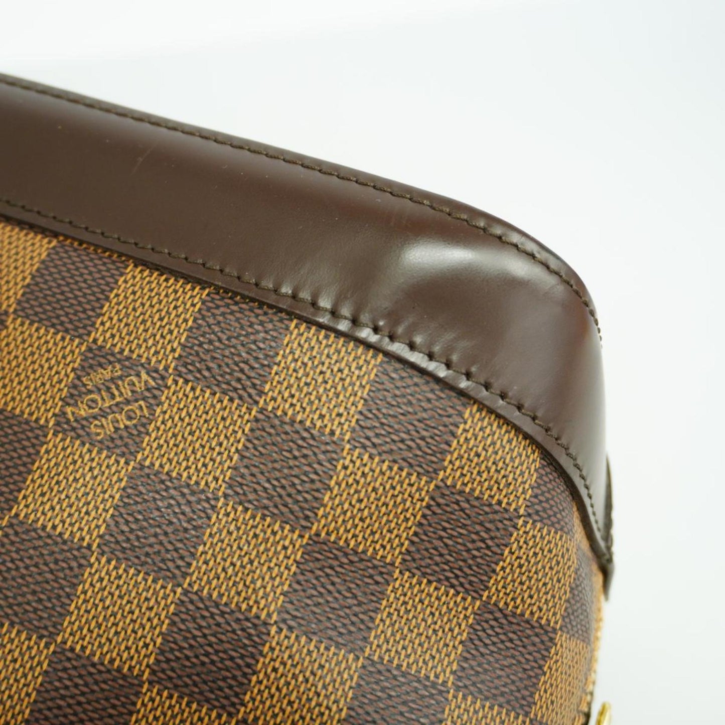 LOUIS VUITTON Alma Handbag