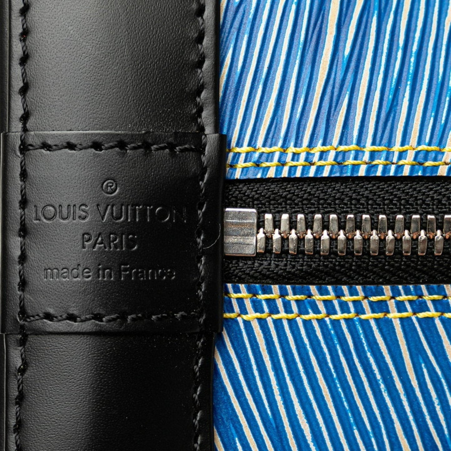 LOUIS VUITTON Alma Handbag