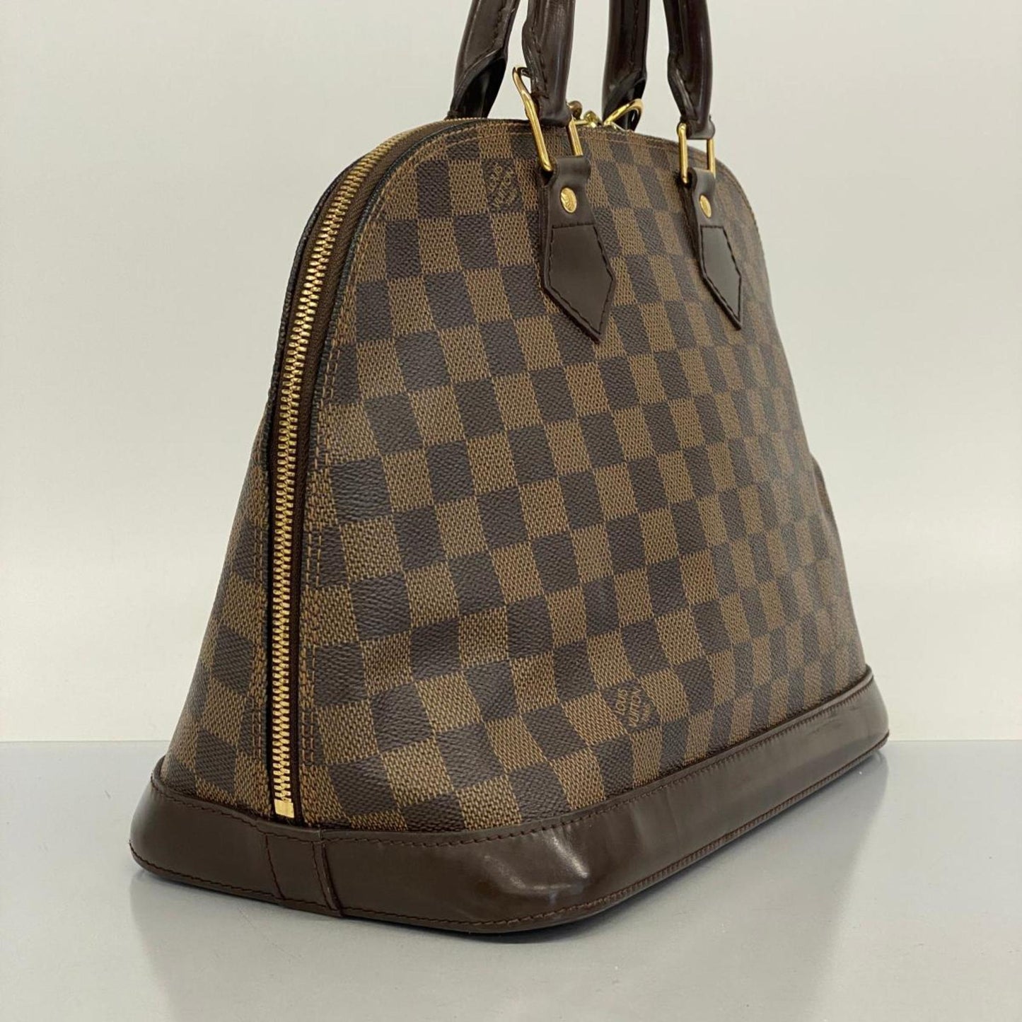 LOUIS VUITTON Alma Handbag