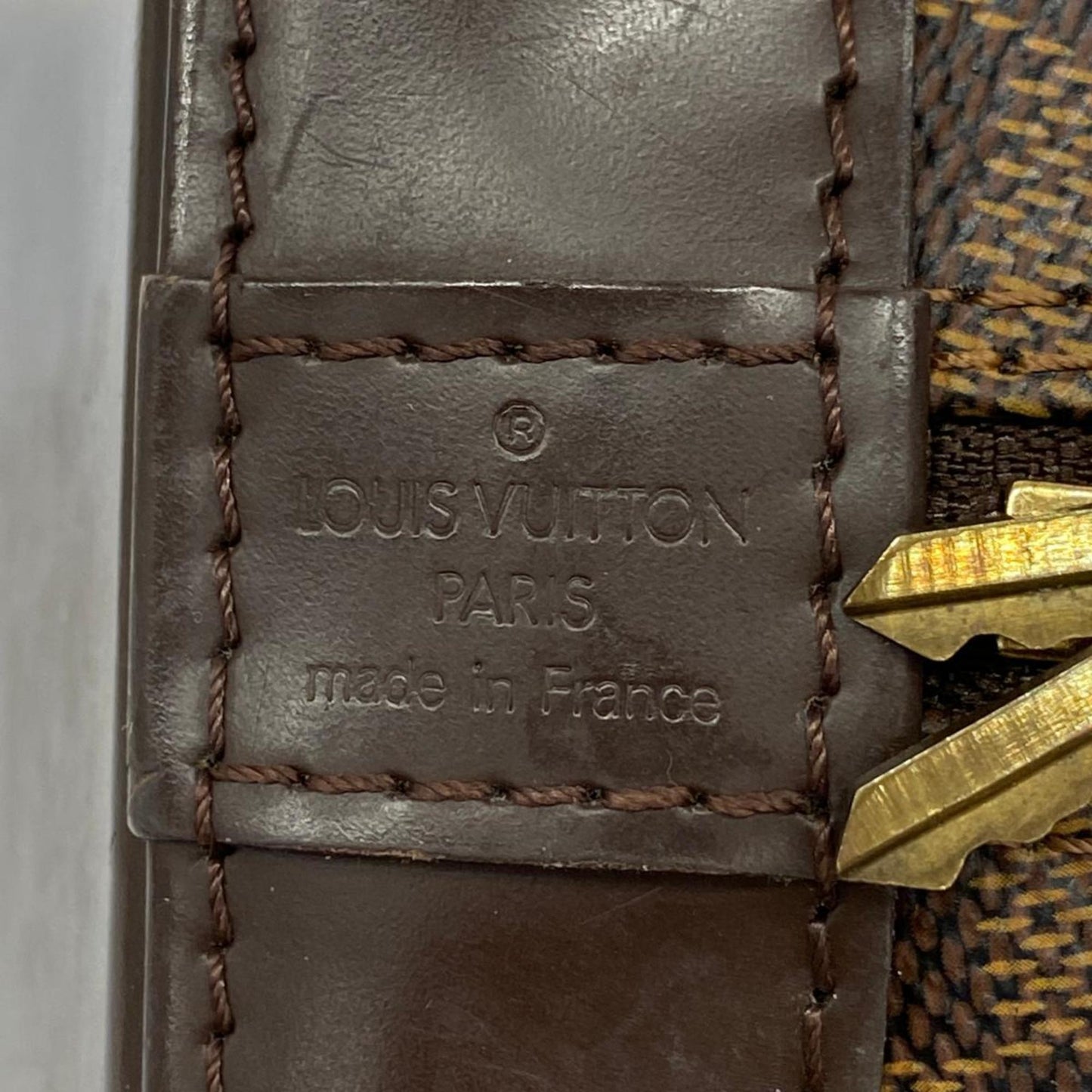 LOUIS VUITTON Alma Handbag