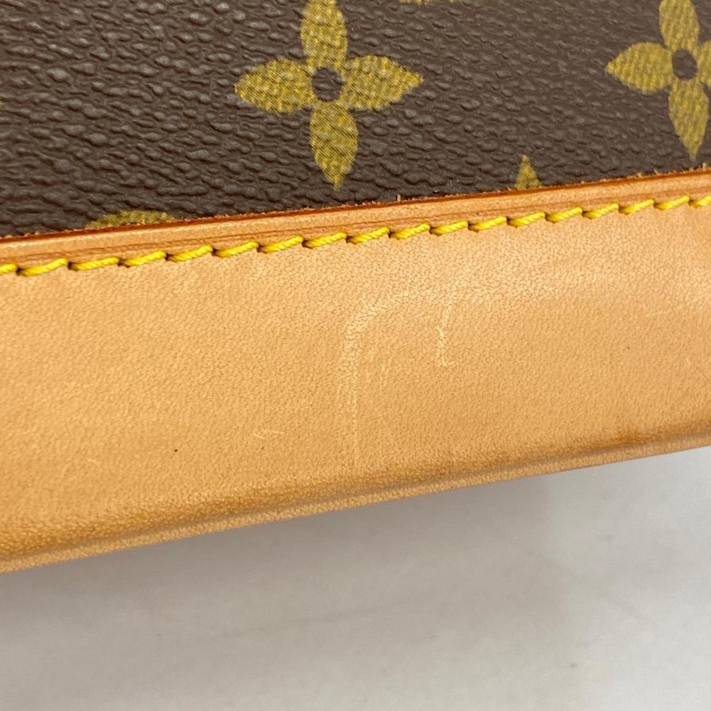 LOUIS VUITTON Alma Handbag