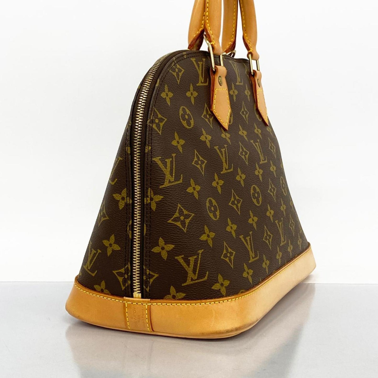 LOUIS VUITTON Alma Handbag