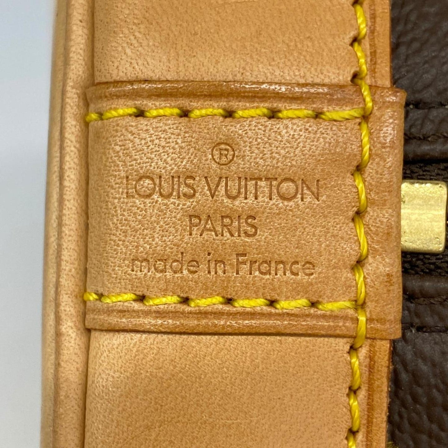 LOUIS VUITTON Alma Handbag