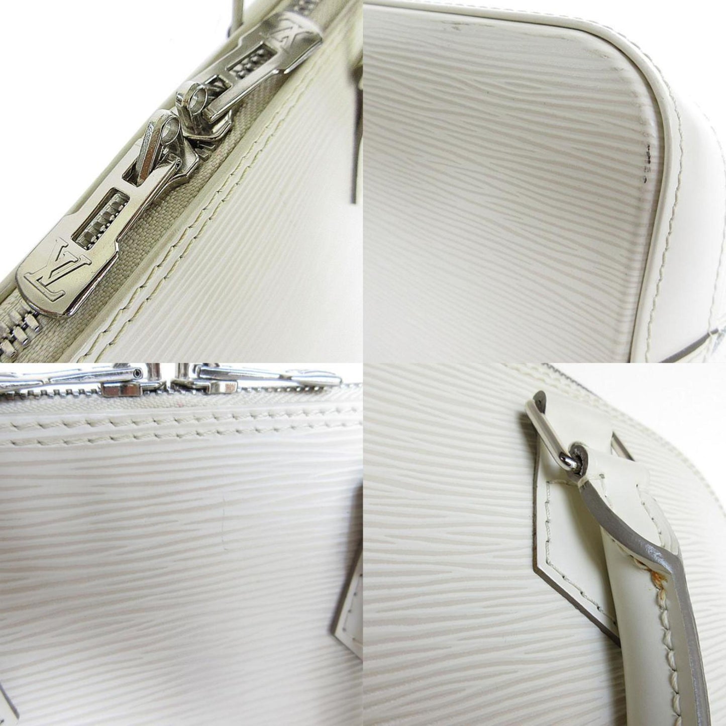 LOUIS VUITTON Alma Handbag