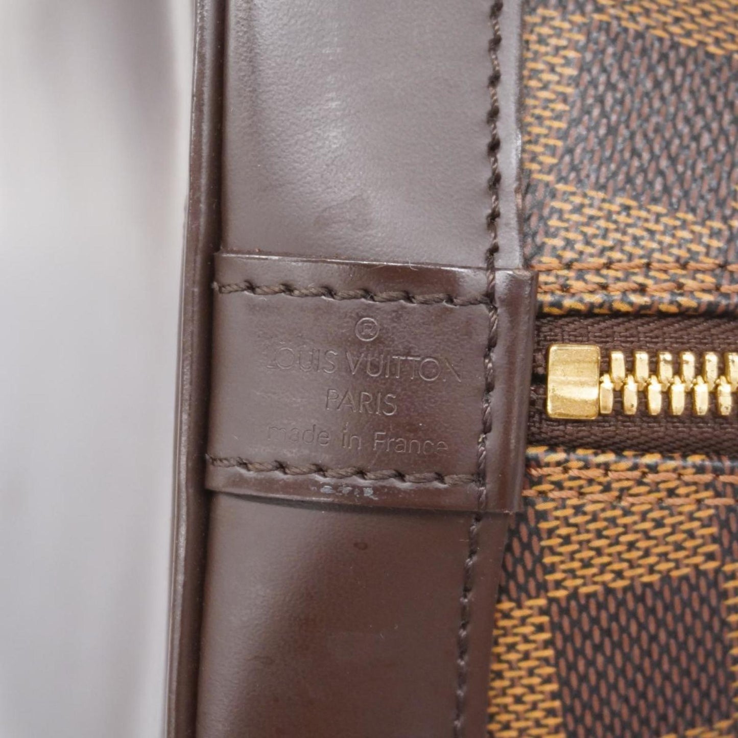 LOUIS VUITTON Alma Handbag