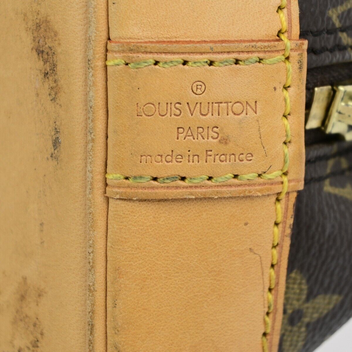 LOUIS VUITTON Alma Handbag