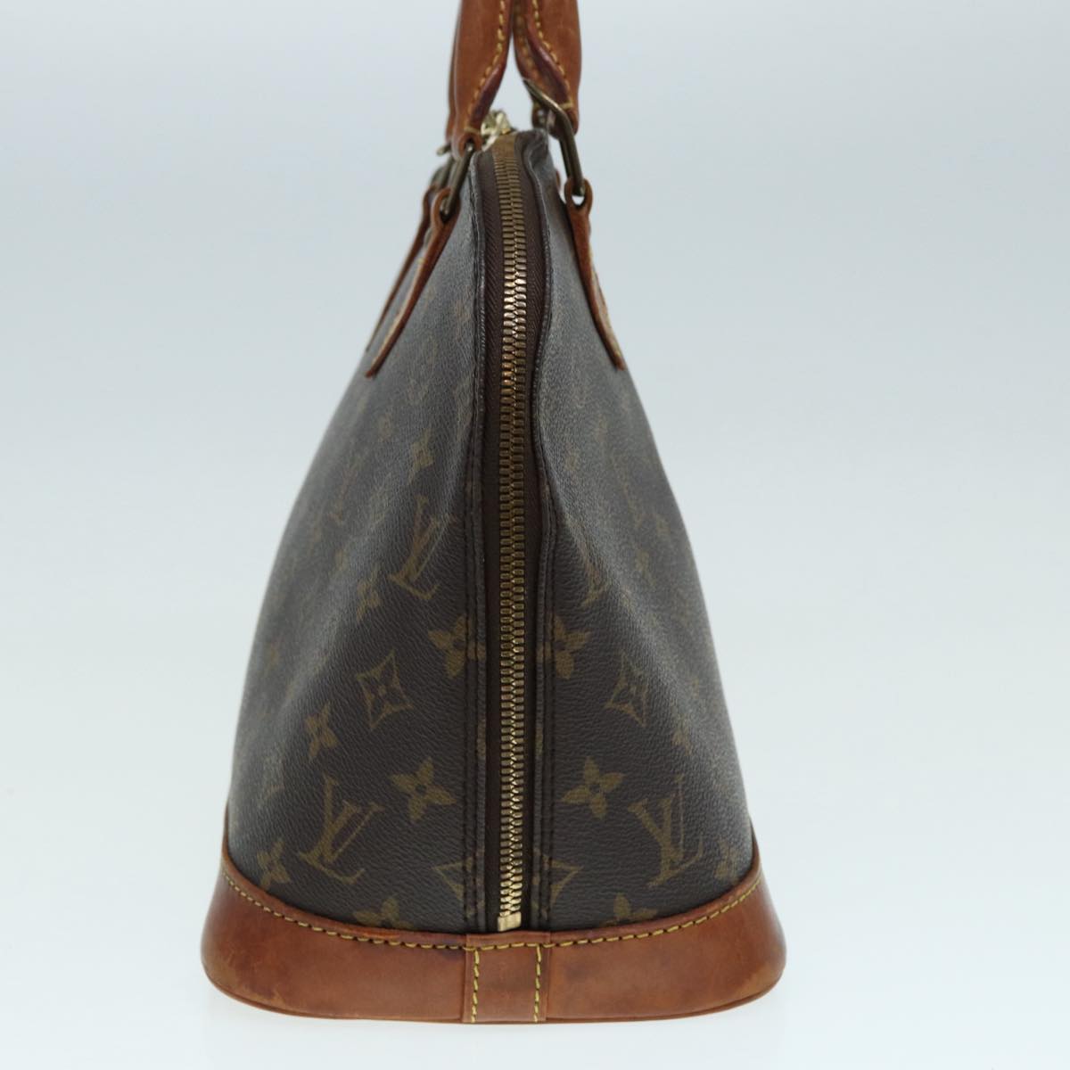 LOUIS VUITTON Alma Handbag