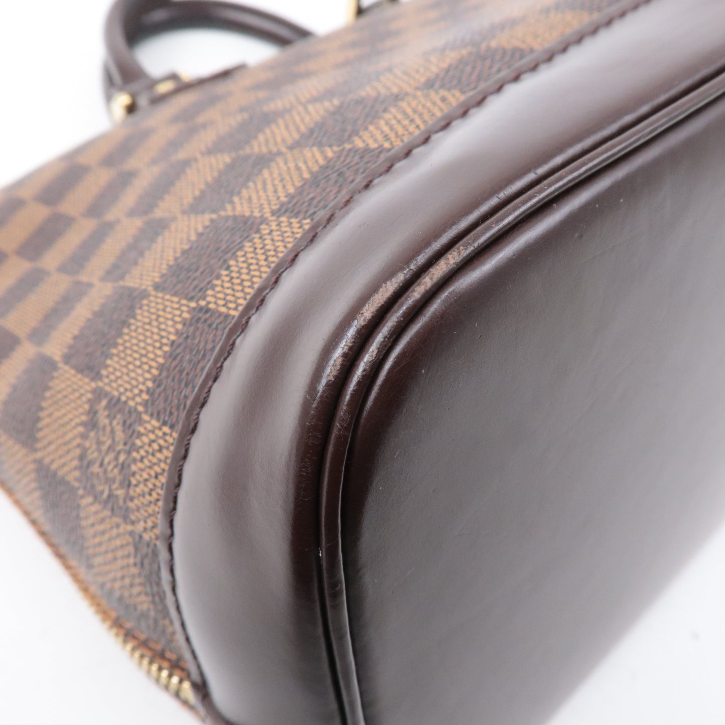 Louis Vuitton Damier Ebene Alma Hand Bag Brown N51131