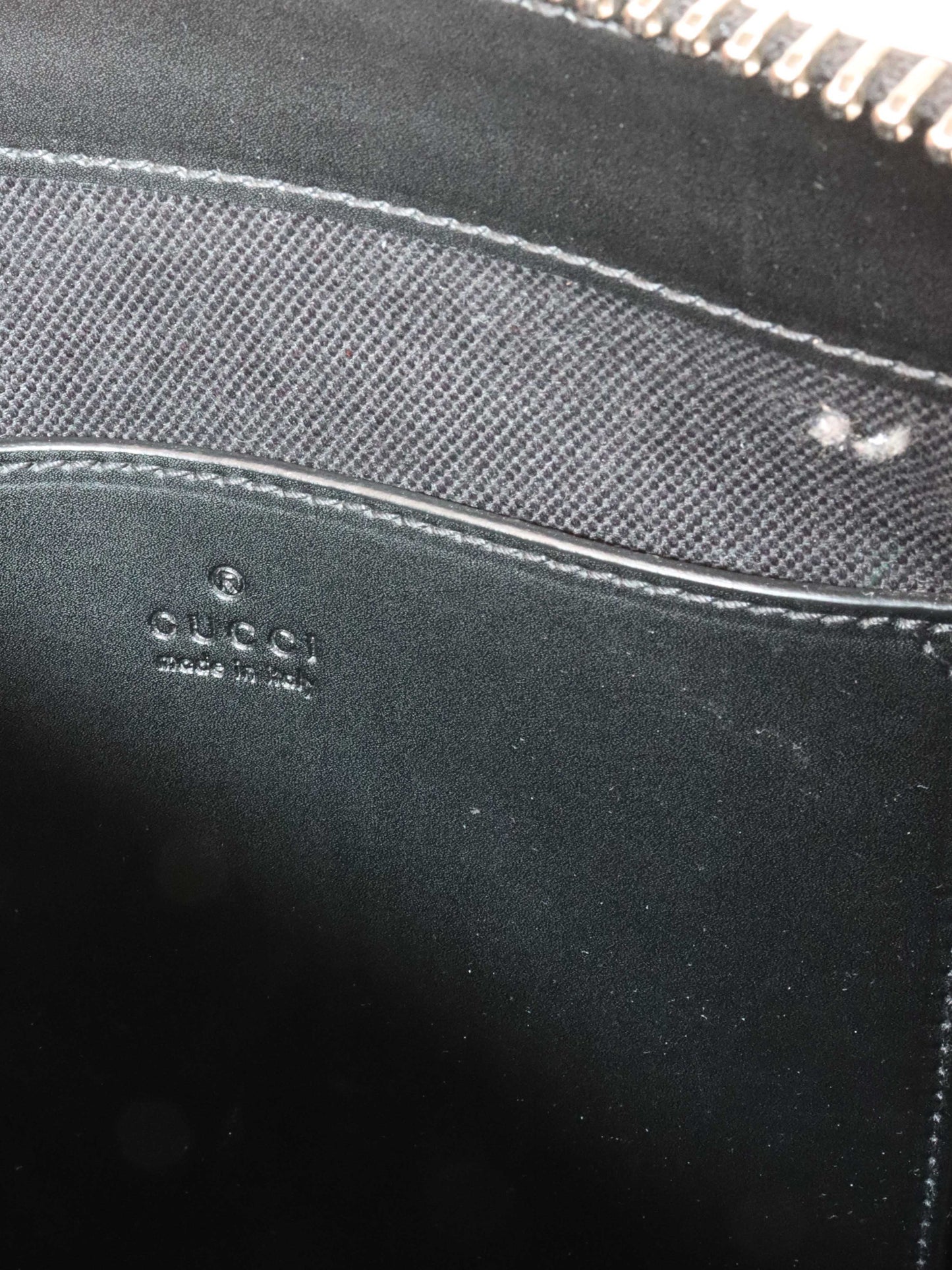 Gucci Black Monogram Messenger Bag.