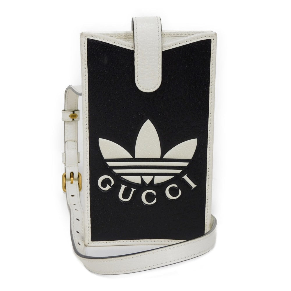 GUCCI 702203 UZ3BT 1057 Textured leather black Adidas Phone Cases