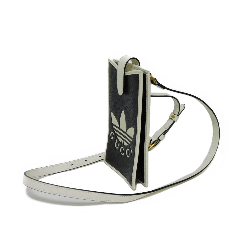 GUCCI 702203 UZ3BT 1057 Textured leather black Adidas Phone Cases
