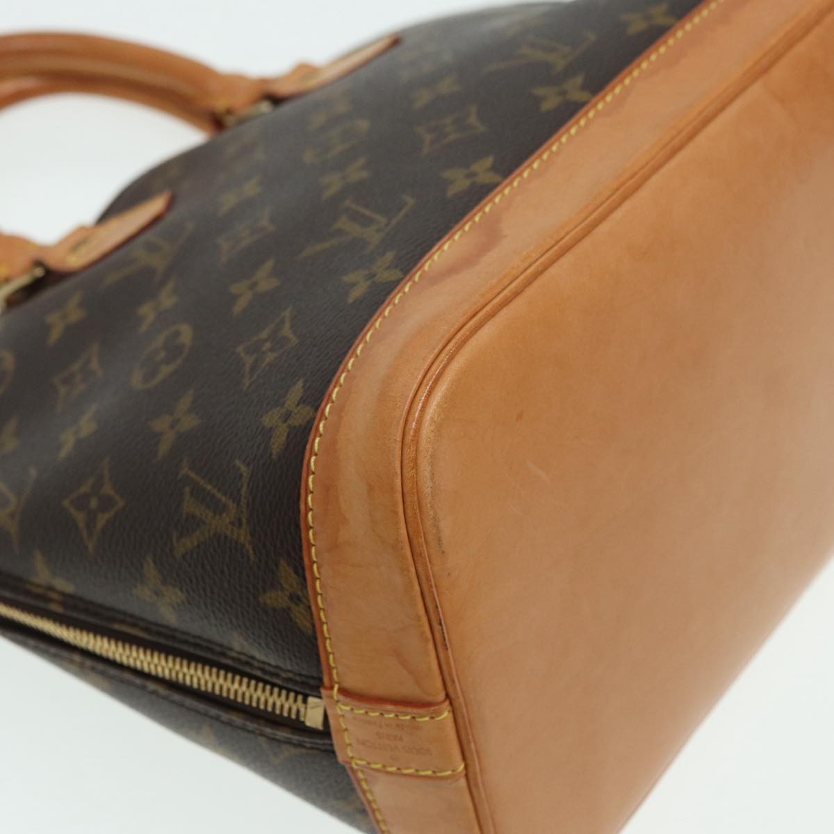 LOUIS VUITTON Alma Handbag