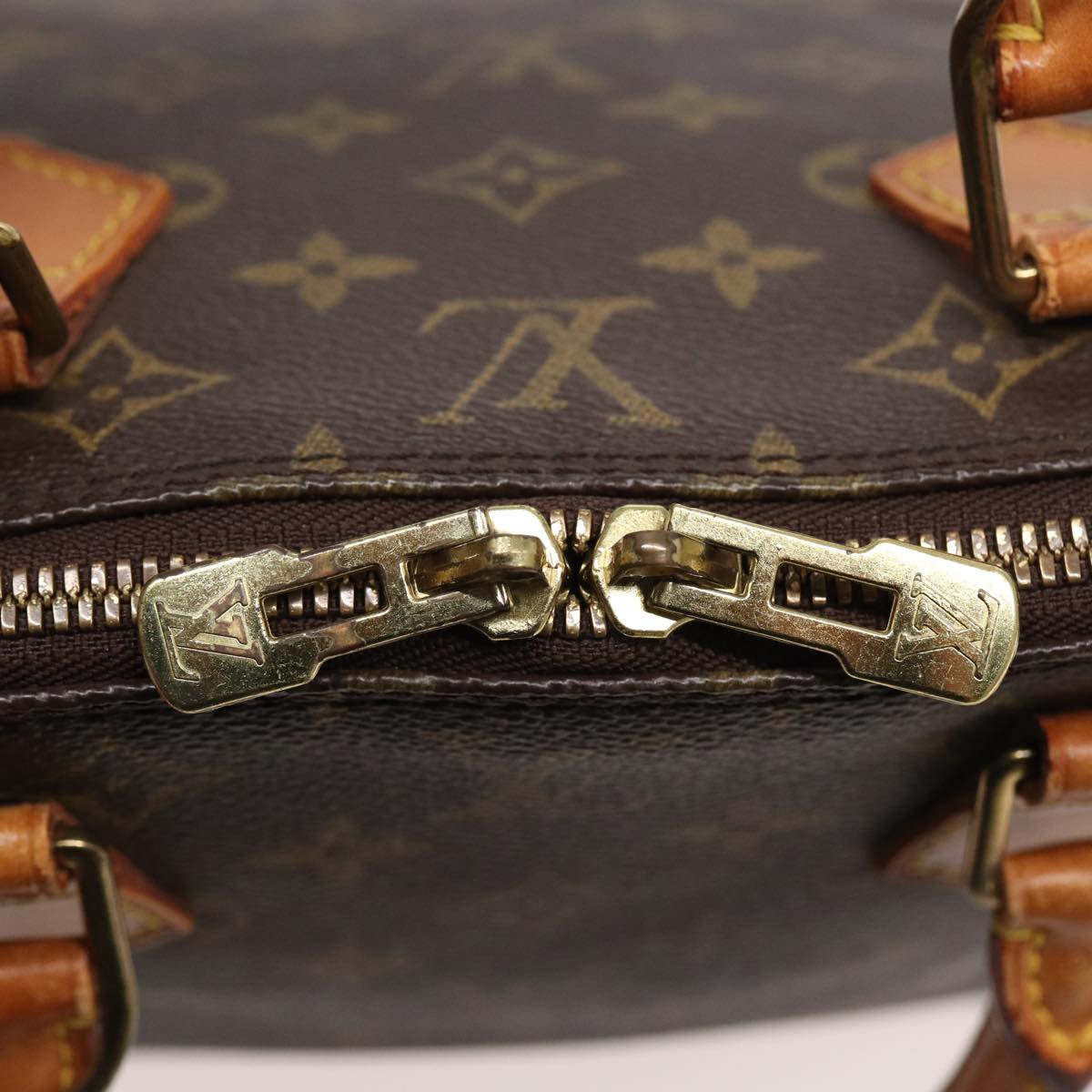 LOUIS VUITTON Alma Handbag