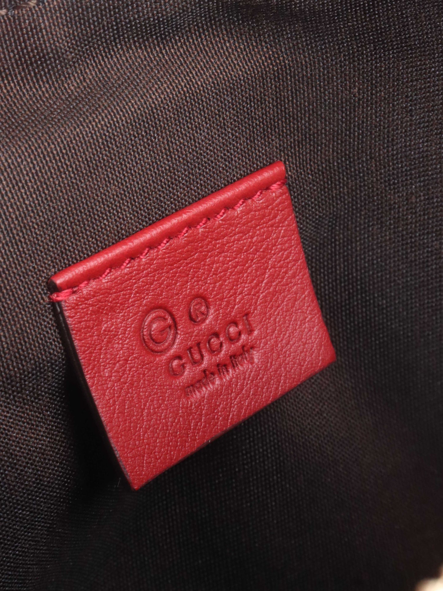 Gucci Red Cosmetic Pouch.