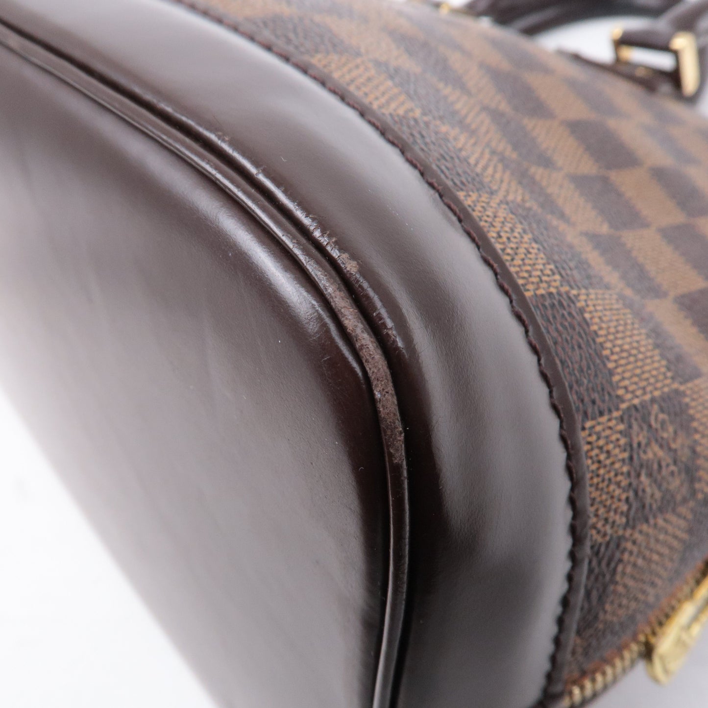 Louis Vuitton Damier Ebene Alma Hand Bag Brown N51131