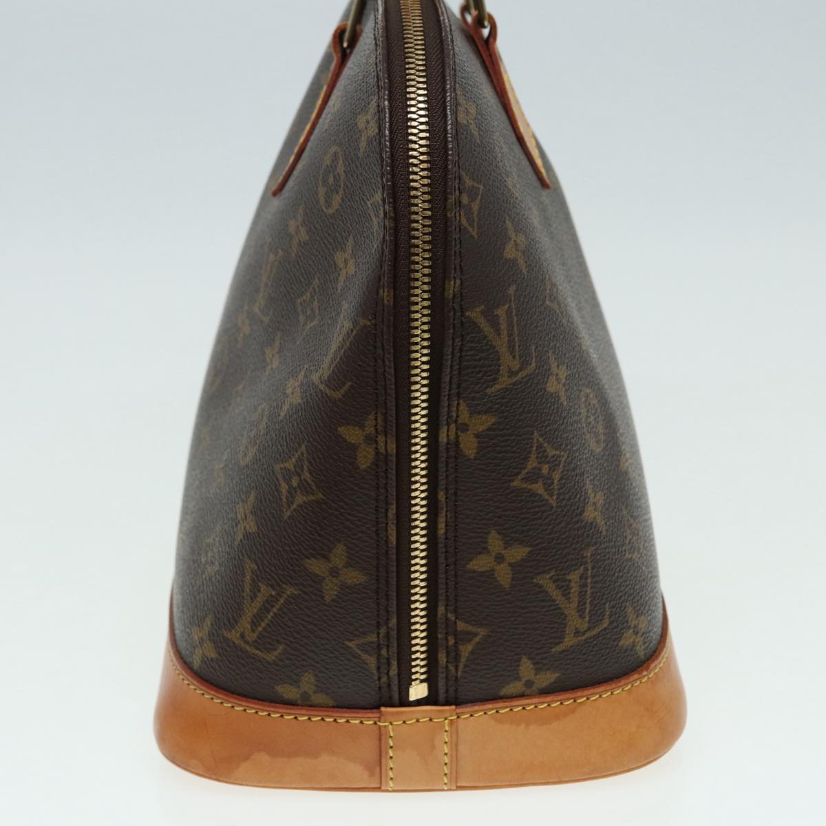 LOUIS VUITTON Alma Handbag