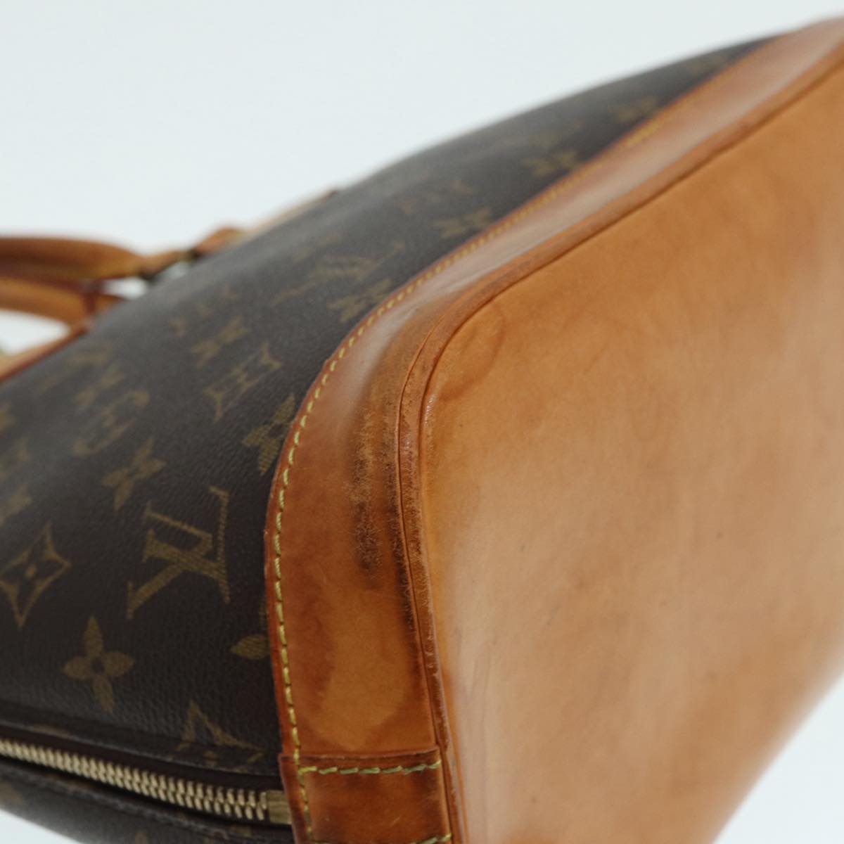 LOUIS VUITTON Alma Handbag