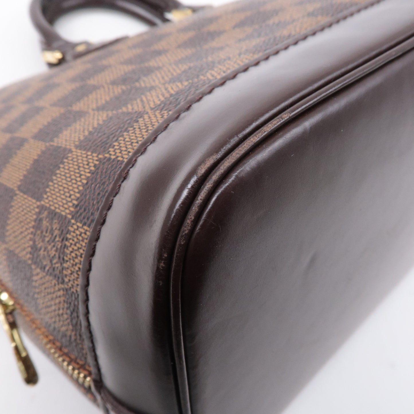 Louis Vuitton Damier Ebene Alma Hand Bag Brown N51131