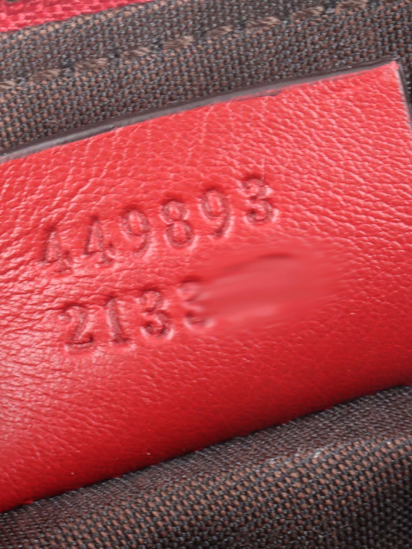 Gucci Red Cosmetic Pouch.