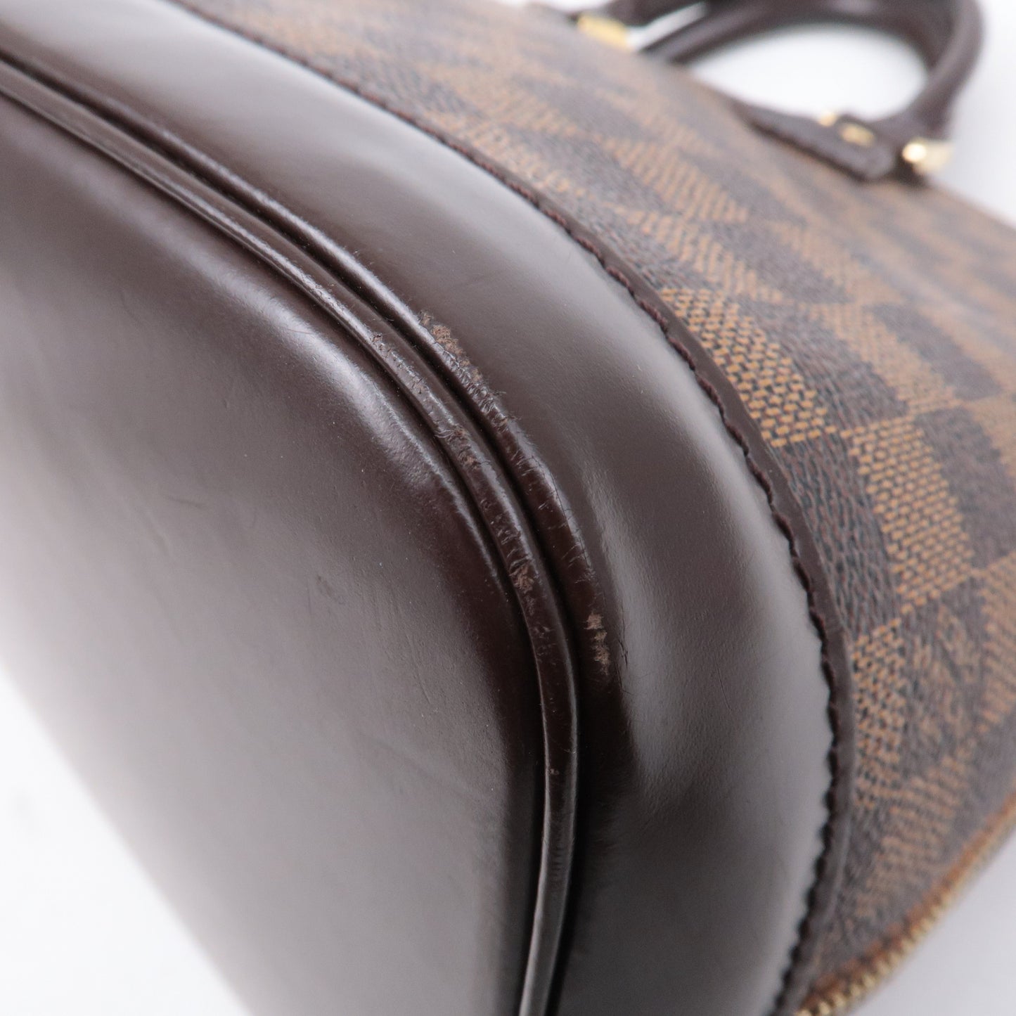 Louis Vuitton Damier Ebene Alma Hand Bag Brown N51131